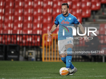 Amir Rrahmani of Napoli in action during the UEFA Europa League Round of 32 match between Granada CF and SSC Napoli at Estadio Nuevo los Car...