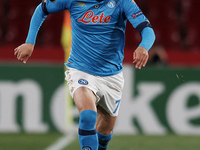 Eljif Elmas of Napoli runs with the ball during the UEFA Europa League Round of 32 match between Granada CF and SSC Napoli at Estadio Nuevo...