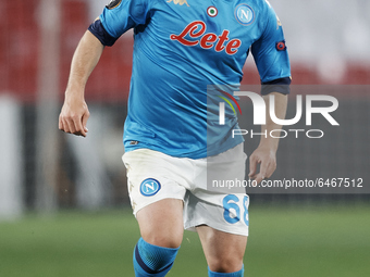 Stanislav Lobotka of Napoli runs with the ball during the UEFA Europa League Round of 32 match between Granada CF and SSC Napoli at Estadio...