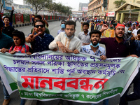 Students of seven Dhaka University-affiliated colleges block a road as they protest against the suspension of examinations, in Dhaka, Bangla...
