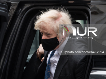 British Prime Minister Boris Johnson arrives in Downing Street after PMQs at the House of Commons on 24 February, 2021 in London, England. T...