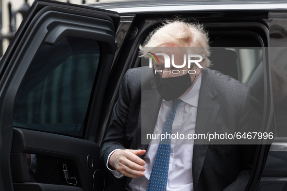 British Prime Minister Boris Johnson arrives in Downing Street after PMQs at the House of Commons on 24 February, 2021 in London, England. T...