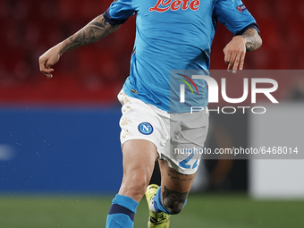 Giovanni Di Lorenzo of Napoli runs with the ball during the UEFA Europa League Round of 32 match between Granada CF and SSC Napoli at Estadi...