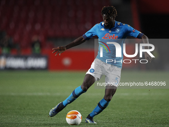 Tiemoue Bakayoko of Napoli in action during the UEFA Europa League Round of 32 match between Granada CF and SSC Napoli at Estadio Nuevo los...