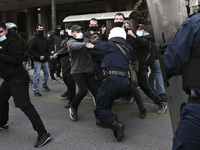Greek police officers clash with protesters protester during a demonstration in support to Dimitris Koufontinas, the jailed hitman of the no...