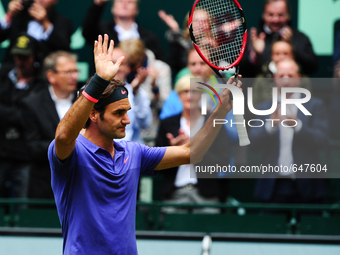 Roger Feder salutes the public after advancing to the final of the Gerry Weber Open final after defeating Ivo Karlovic with 7:6, 7:6 in Hall...