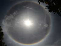 A sun halo is seen in Bangkok, Thailand on June 21, 2015. (