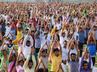 Indian perform Yoga excerise ( Aasan) on the occasion of first International Yoga Day celebration at Sawai Mansingh Stadium , in Jaipur capi...