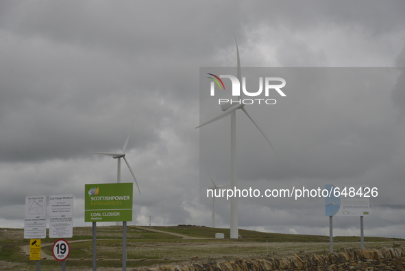 A turbine at the Coal Clough wind farm, on Sunday 21st June 2015, generating electricity for the United Kingdom's energy supply network know...