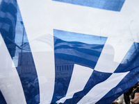 Demonstration organized by public sector union ADEDY, supporters of SYRIZA, and leftist organizations at Syntagma Square demanding the aboli...