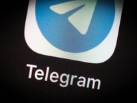 The Telegram encrypted messaging application icon is seen on an iPhone home screen in Warsaw, Poland on March 3, 2021. (