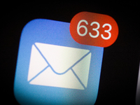 The Apple Mail application icon is seen on an iPhone home screen in Warsaw, Poland on March 3, 2021. (