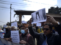 Nepalese Citizen Society activists holds placards and shows the three-finger salute during protest against the military coup in-front of Mya...