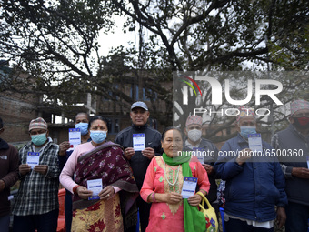 Nepalese People above 65 shows vaccination card after getting first dose of COVID19 vaccines developed by Oxford- AstraZeneca Plc at Bal Kum...