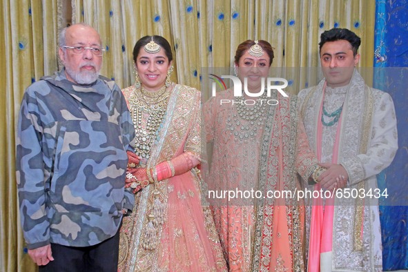 Bollywood filmmaker JP Dutta poses for a photograph with his wife Bindiya Goswami, and newlywed daughter Nidhi Dutta and son-in-law Binoy Ga...