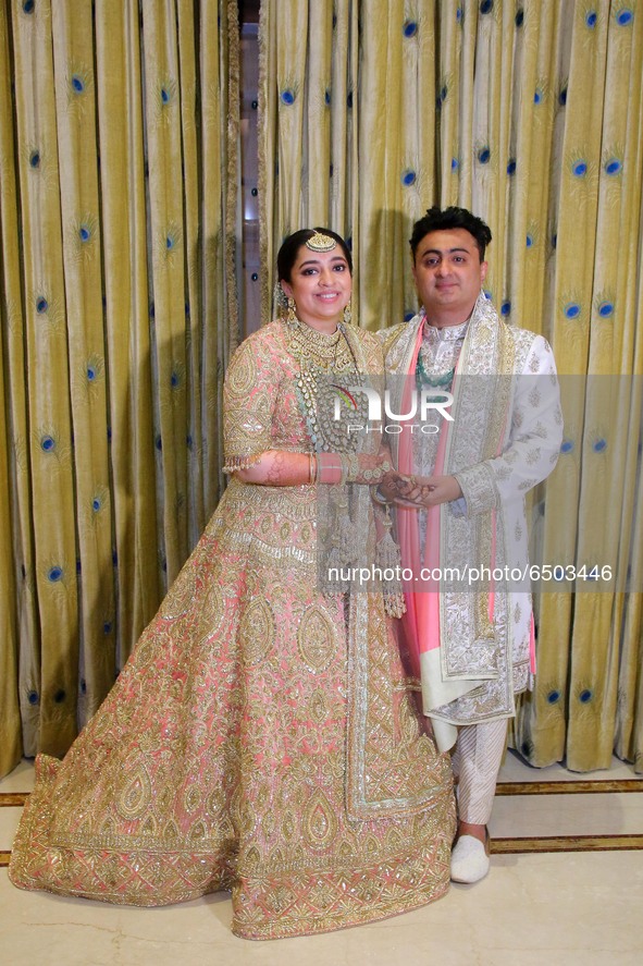 Bollywood filmmaker JP Dutta's newlywed daughter Nidhi Dutta and son-in-law Binoy Gandhi  poses for a photograph during the wedding ceremony...