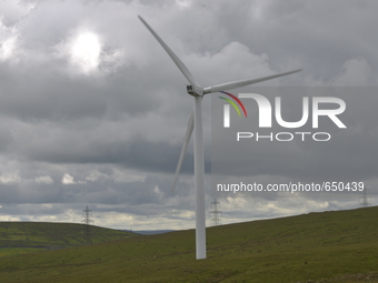 Turbines at the Todmorden Moor wind farm, on Sunday 21st June 2015, generating electricity for the United Kingdom's energy supply network kn...