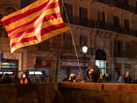 Protestor holds Catolonia's flag during a protests for the arrest of rapper Pablo Hasel, which occurred in the city of Barcelona, Spain, on...