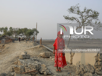 Salinity effect seen in soil as a result trees has died after Cyclone amphan hit in Satkhira, Bangladesh on March 20, 2021. Deep cracks seen...