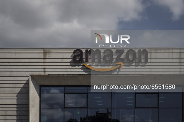 Amazon's logo on March 22, 2021 outside the Amazon plant in Arzano in Naples, Italy, on March 22, 2021. The national strike is in protest ag...