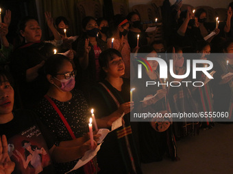 Chin Refugees from Myanmar living in India hold a candle vigil, organised by Chin Refugee Committee, to pay tribute to the people who died a...