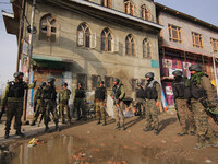Indian soldiers arrive near the spot where suspected militants carried an attack on Indian paramilitary forces in Lawaypora on Srinagar outs...