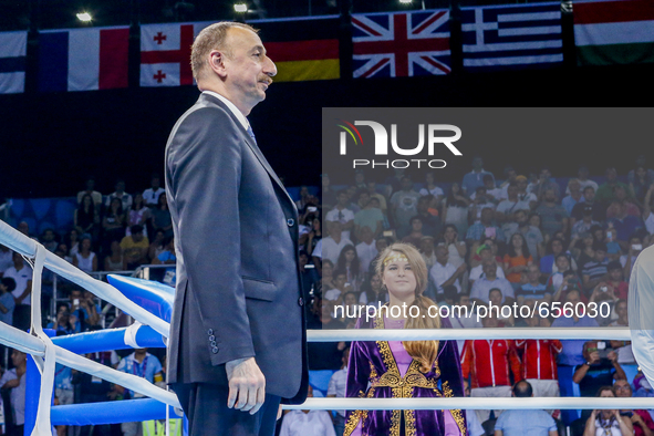 President of Azerbaijan Ilham Aliyev observes the national anthem  during the medal ceremony for the Men's Light Heavyweight 81kg final of t...