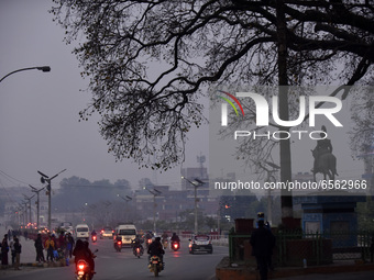 Vehicles seen in a smoggy and foggy weather in Kathmandu, Nepal on Friday, March 26, 2021. The AQI pollution level on Friday steadily climbe...