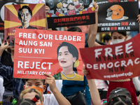 Signs with  Myanmar official Leader Aung San Suu Kyi reading free our leader during a prayer's Anti Myanmar Coup protest in Taipei, Taiwan,...