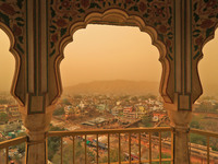 View of a city neighbourhood in Jaipur, Rajasthan, India, on March 30, 2021  is seen shrouded in haze, during a cloudy and dusty weather. (