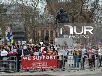 LONDON, UNITED KINGDOM - MARCH 31, 2021: Protesters demonstrate in Parliament Square against the military coup and killing of civilians duri...