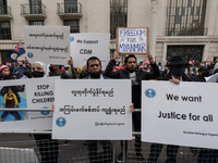 LONDON, UNITED KINGDOM - MARCH 31, 2021: Protesters demonstrate outside the Chinese Embassy in central London against the military coup and...