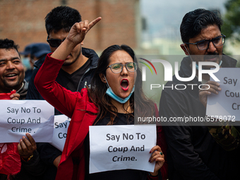 Nepalese student chants slogan during a protest against military coup in Myanmar in front of Myanmar Embassy in Lalitpur, Nepal on March 31,...