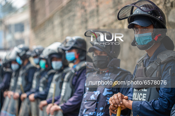 Nepalese Police guard Myanmar embassy during a protest against military coup in Myanmar in Lalitpur, Nepal on March 31, 2021. 