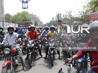 Bangladeshi Ride-sharing Motorcyclists stage a road block demonstration against the closure of the ride sharing service in Dhaka, Bangladesh...