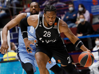 Will Thomas (L) of Zenit St Petersburg and Guerschon Yabusele of LDLC ASVEL Villeurbanne in action during the EuroLeague Basketball match be...