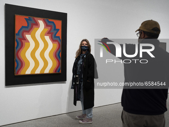 a person observes one of the works that make up the exhibition 'Moroccan Trilogy', at the Reina Sofía Museum, in Madrid, (Spain), on April 2...