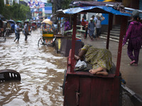 DHAKA, BANGLADESH  27th June : Waterlogged streets during rain  in Dhaka on 27th June 2015.Heavy raining in the city continued for a four co...