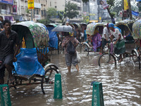 DHAKA, BANGLADESH  27th June : Waterlogged streets during rain  in Dhaka on 27th June 2015.Heavy raining in the city continued for a four co...