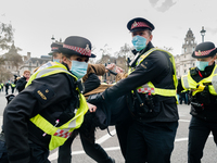 A man is arrested by Met Police during a Kill The Bill protest in London, Britain, 3 April 2021. Protests around the United Kingdom have bee...