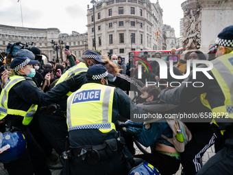 Police scuffle with protesters during Kill The Bill protest in London, Britain, 3 April 2021. Protests around the United Kingdom have been h...