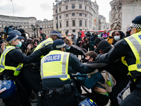 Police scuffle with protesters during Kill The Bill protest in London, Britain, 3 April 2021. Protests around the United Kingdom have been h...