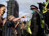 LONDON, UNITED KINGDOM - APRIL 03, 2021: Police clash with demonstrators in Parliament Square after a protest against government’s Police, C...