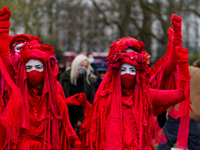 Red robed Extinction Rebellion protesters attend a 'Kill the Bill' protest in London, Britain, 3 April 2021. Protests around the United King...