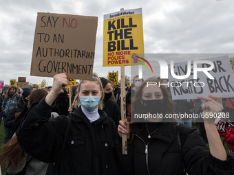 LONDON, UNITED KINGDOM - APRIL 03, 2021: Protesters demonstrate in Hyde Park before marching through central London against government’s Pol...