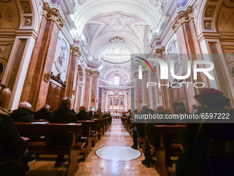 People praying in the Holy Mass in Santa Maria del Suffragio Church during ceremony of 12th anniversary of earthquake in L'Aquila, Italy, on...