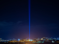 A light beam shining during ceremony of 12th anniversary of earthquake in L'Aquila, Italy, on April 5, 2021. The 12th anniversary of the L'A...
