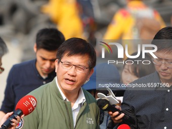 Taiwan Minister of Transportation and Communications Mr Lin Chia-Long speaks to the media as he inspects the scene of the train derailment,...