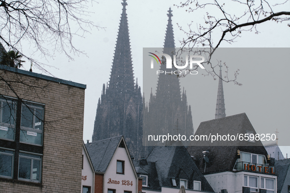 Dom cathedral  is seen as rare April snowfalls in Cologne, Germany on April 6, 2021 