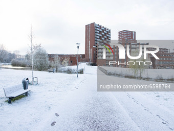 Snow covered residential area. The Netherlands wakes up snow covered after an intense morning snowfall, a bizzar event for April. The second...